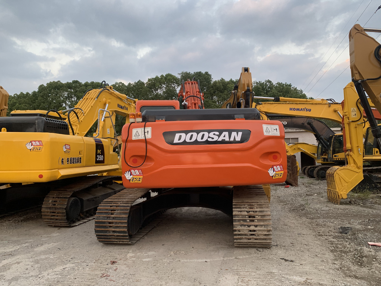 DOOSAN DX225LC - حفار ذو عجلات: صورة 1 DOOSAN DX225LC - حفار ذو عجلات: صورة 1