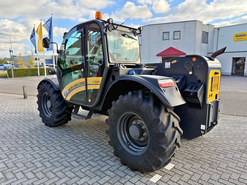 New Holland TH7.37 Plus Verreiker - آلة رفع ونقل تلسكوبية: صورة 2 New Holland TH7.37 Plus Verreiker - آلة رفع ونقل تلسكوبية: صورة 2