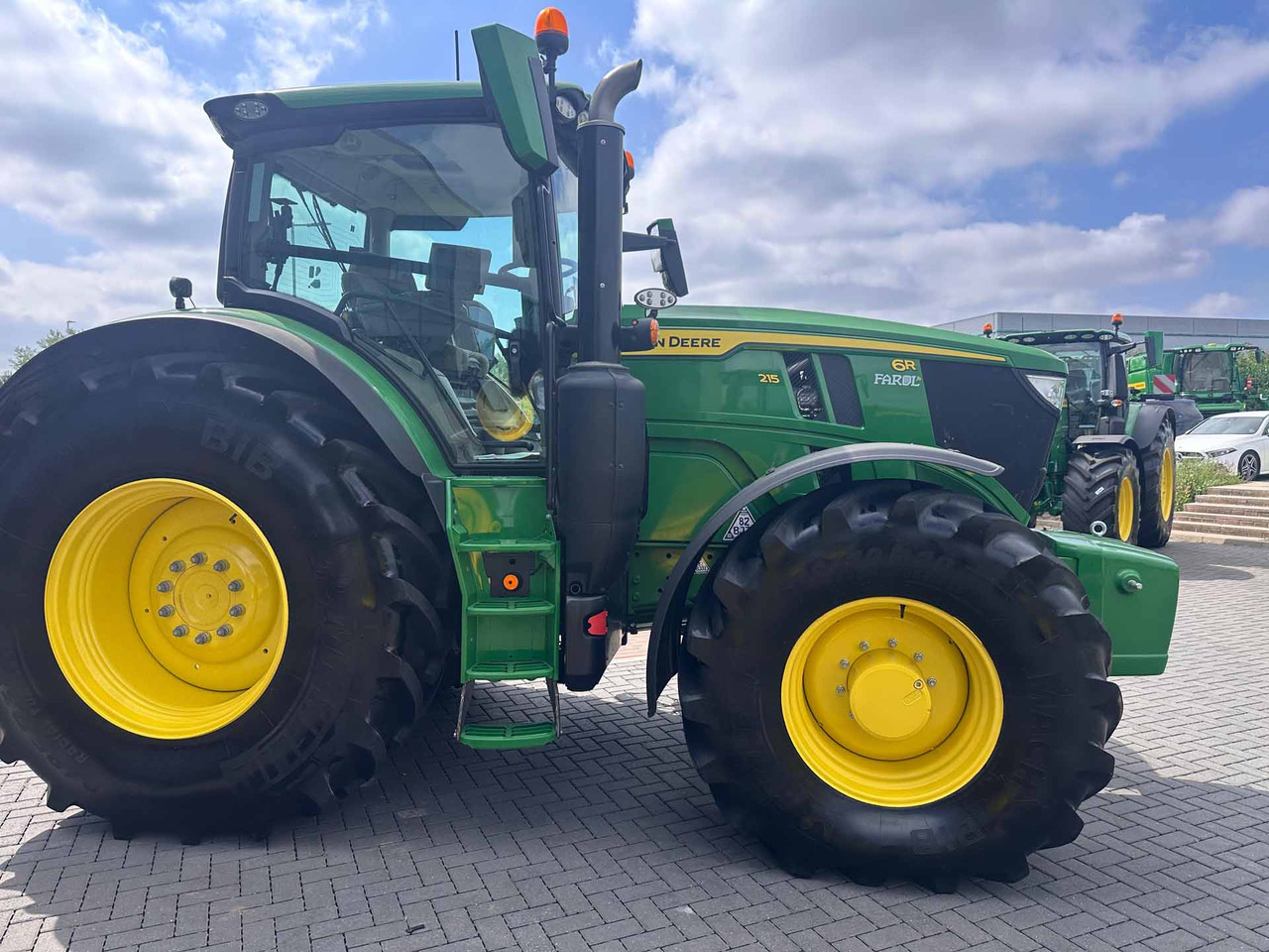 John Deere 6R 215 - جرار: صورة 4 John Deere 6R 215 - جرار: صورة 4