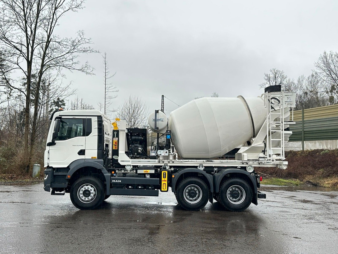 MAN TGS 33.440 6x4 Euro6e Abroller + Fahrmischer - شاحنة برافعة خطافية, شاحنة كرين: صورة 4 MAN TGS 33.440 6x4 Euro6e Abroller + Fahrmischer - شاحنة برافعة خطافية, شاحنة كرين: صورة 4