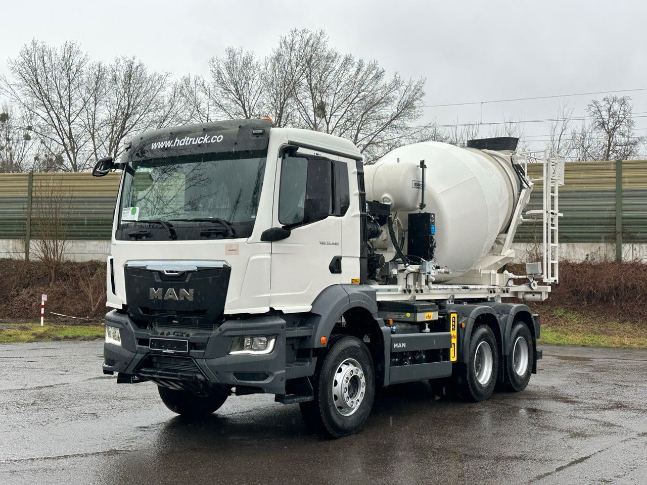 MAN TGS 33.440 6x4 Euro6e Abroller + Fahrmischer - شاحنة برافعة خطافية, شاحنة كرين: صورة 2 MAN TGS 33.440 6x4 Euro6e Abroller + Fahrmischer - شاحنة برافعة خطافية, شاحنة كرين: صورة 2