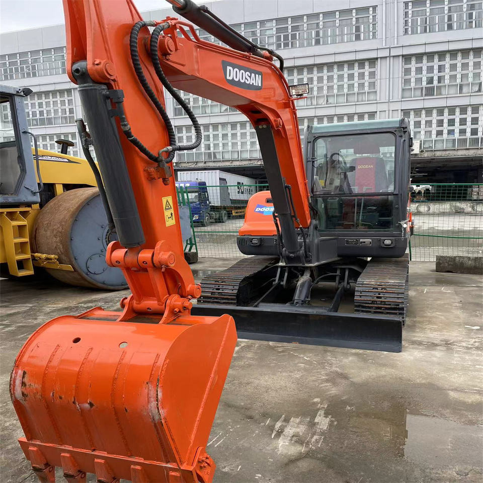 Original Color Used Doosan Dx55 Mini Excavator Used 5 Ton 5.5ton Mini Doosan Excavator for Sale Used Doosan Dx55-9c - حفار صغير: صورة 2 Original Color Used Doosan Dx55 Mini Excavator Used 5 Ton 5.5ton Mini Doosan Excavator for Sale Used Doosan Dx55-9c - حفار صغير: صورة 2