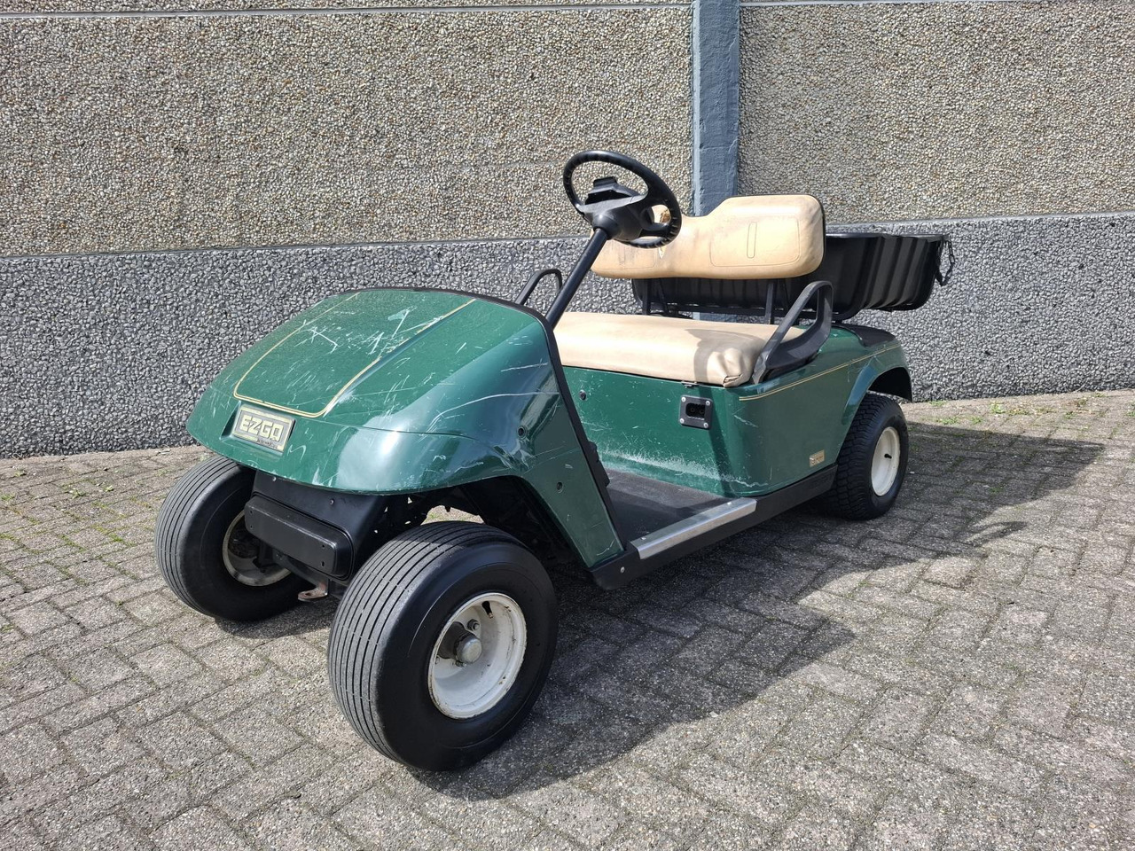 E-Z-GO TXT 2-Persoons Elektrische Golfkar met Open Laadbak 1442482 - عربة جولف: صورة 1 E-Z-GO TXT 2-Persoons Elektrische Golfkar met Open Laadbak 1442482 - عربة جولف: صورة 1