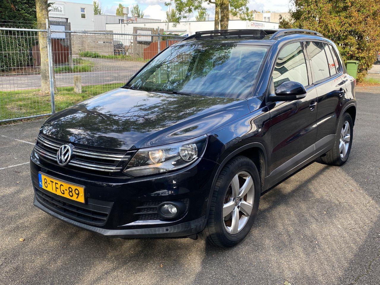 Volkswagen Tiguan 1.4 TSI Comfort&Design Edition | 2014 | 82.628 km | 8TFG89 | NAP: Logisch - سيارة دفع رباعي: صورة 1 Volkswagen Tiguan 1.4 TSI Comfort&Design Edition | 2014 | 82.628 km | 8TFG89 | NAP: Logisch - سيارة دفع رباعي: صورة 1