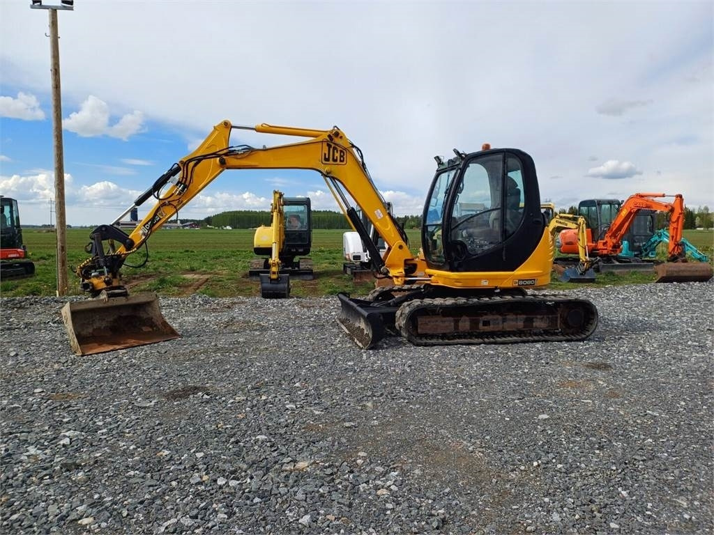 JCB 8080 Engconin pyörittäjällä - حفار صغير: صورة 2 JCB 8080 Engconin pyörittäjällä - حفار صغير: صورة 2