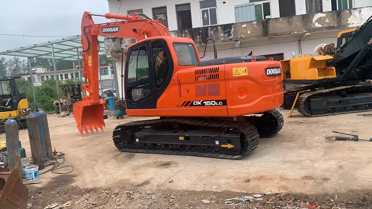 DOOSAN DX150 - حفار زاحف: صورة 1 DOOSAN DX150 - حفار زاحف: صورة 1