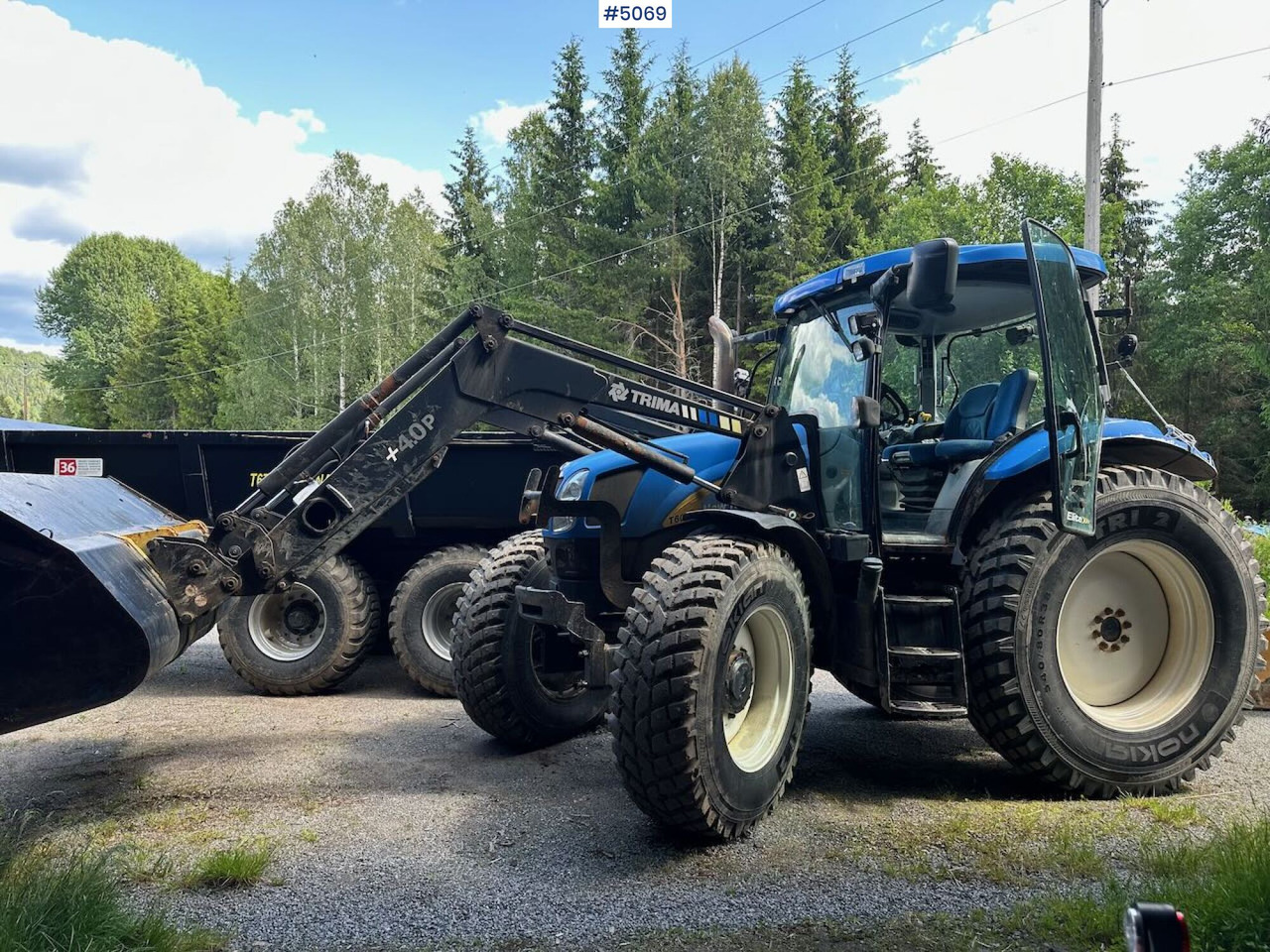 2009 New Holland T6040 SS w/ Trima front loader - جرار: صورة 1 2009 New Holland T6040 SS w/ Trima front loader - جرار: صورة 1