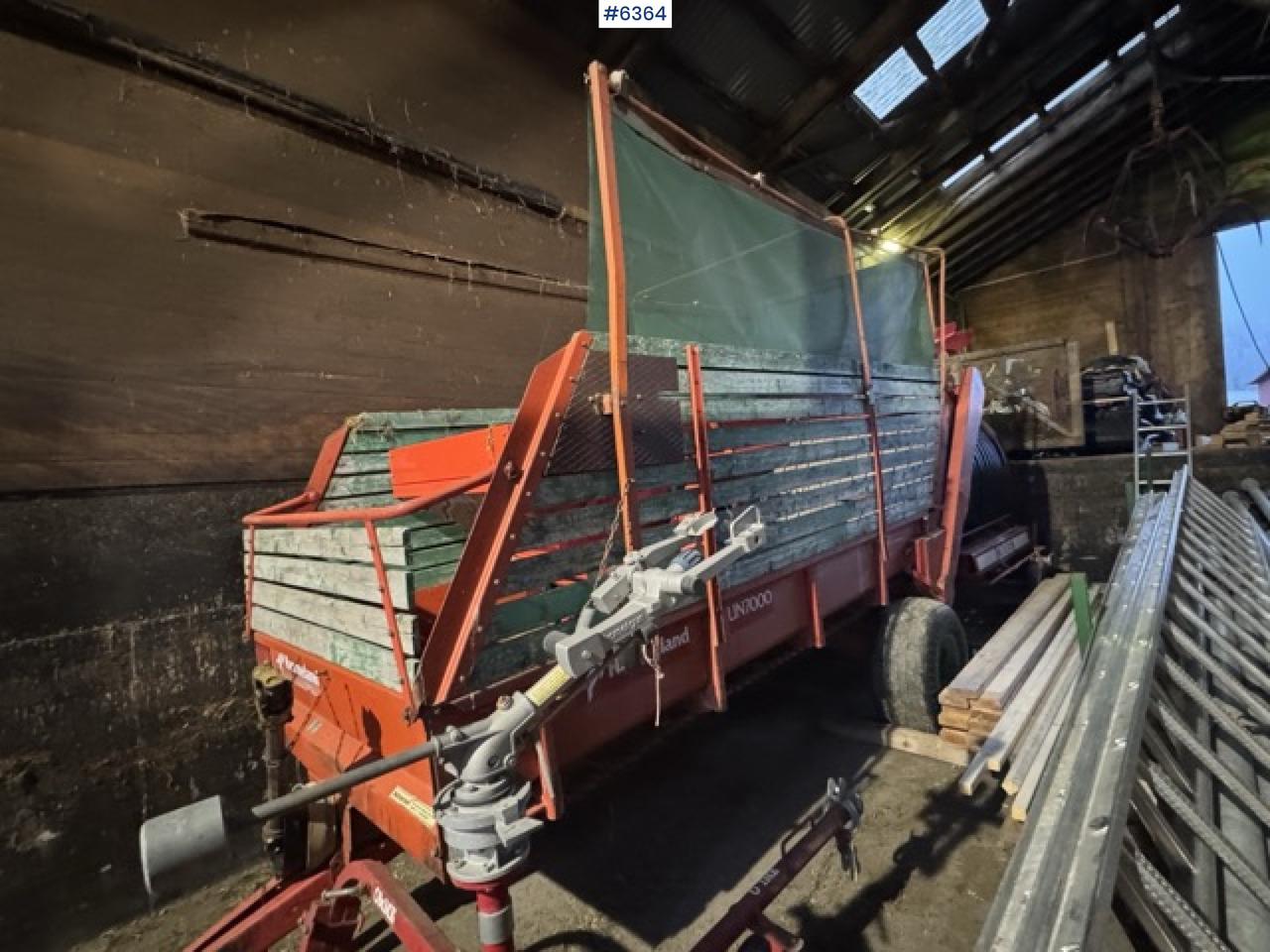 Approx. 1990 Kverneland UN7000 unloading wagon - ماكينات نشر التبن: صورة 1 Approx. 1990 Kverneland UN7000 unloading wagon - ماكينات نشر التبن: صورة 1