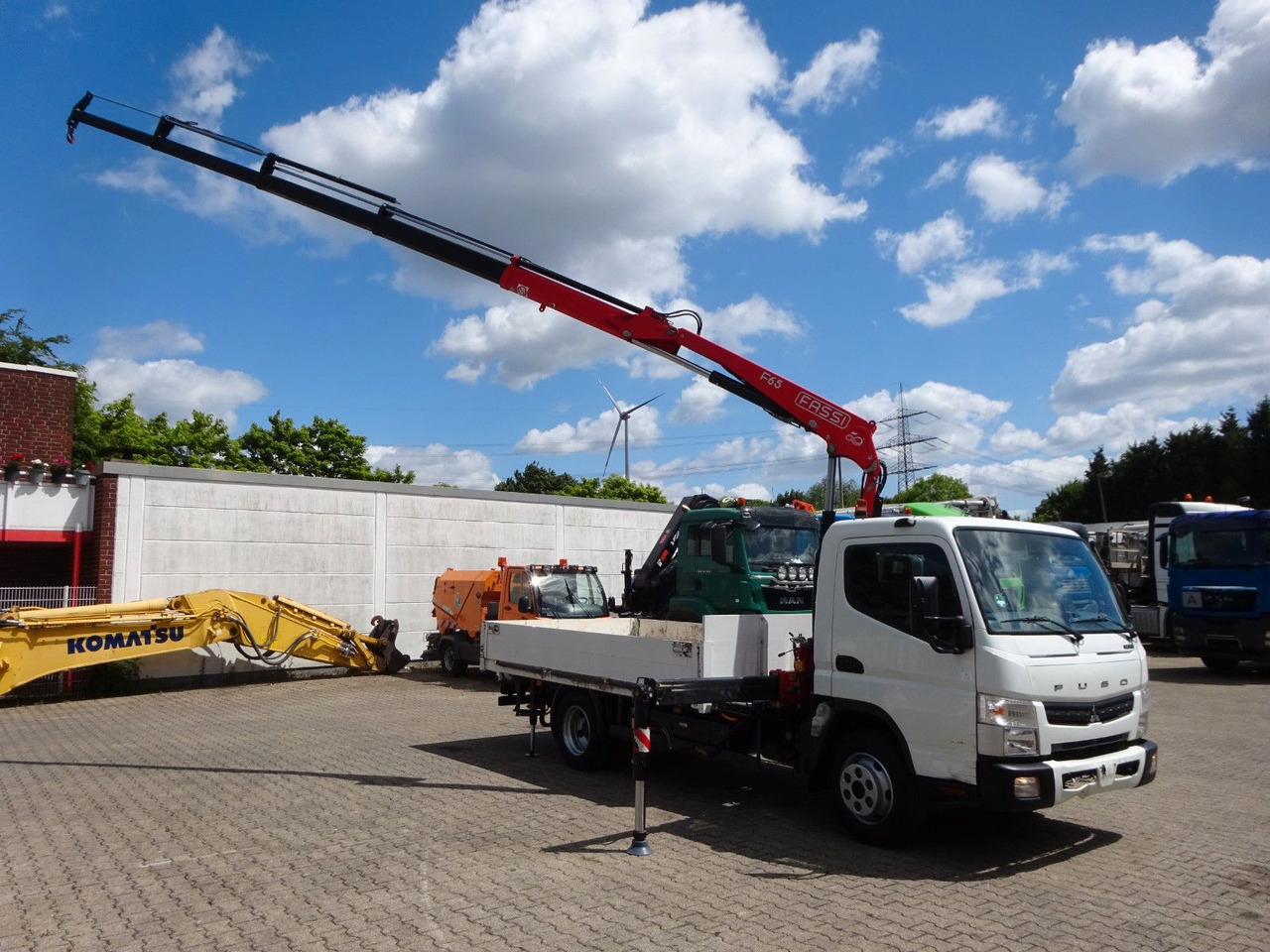 FUSO Canter 7C15 mit FASSI F65A Kran - شاحنة توصيل مفتوحة: صورة 5 FUSO Canter 7C15 mit FASSI F65A Kran - شاحنة توصيل مفتوحة: صورة 5