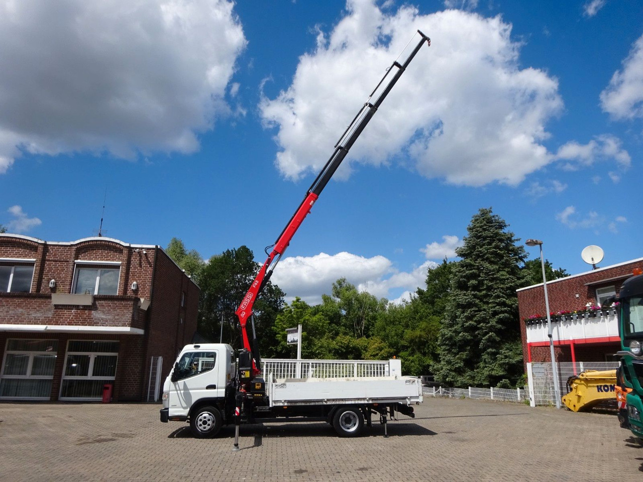 FUSO Canter 7C15 mit FASSI F65A Kran - شاحنة توصيل مفتوحة: صورة 3 FUSO Canter 7C15 mit FASSI F65A Kran - شاحنة توصيل مفتوحة: صورة 3
