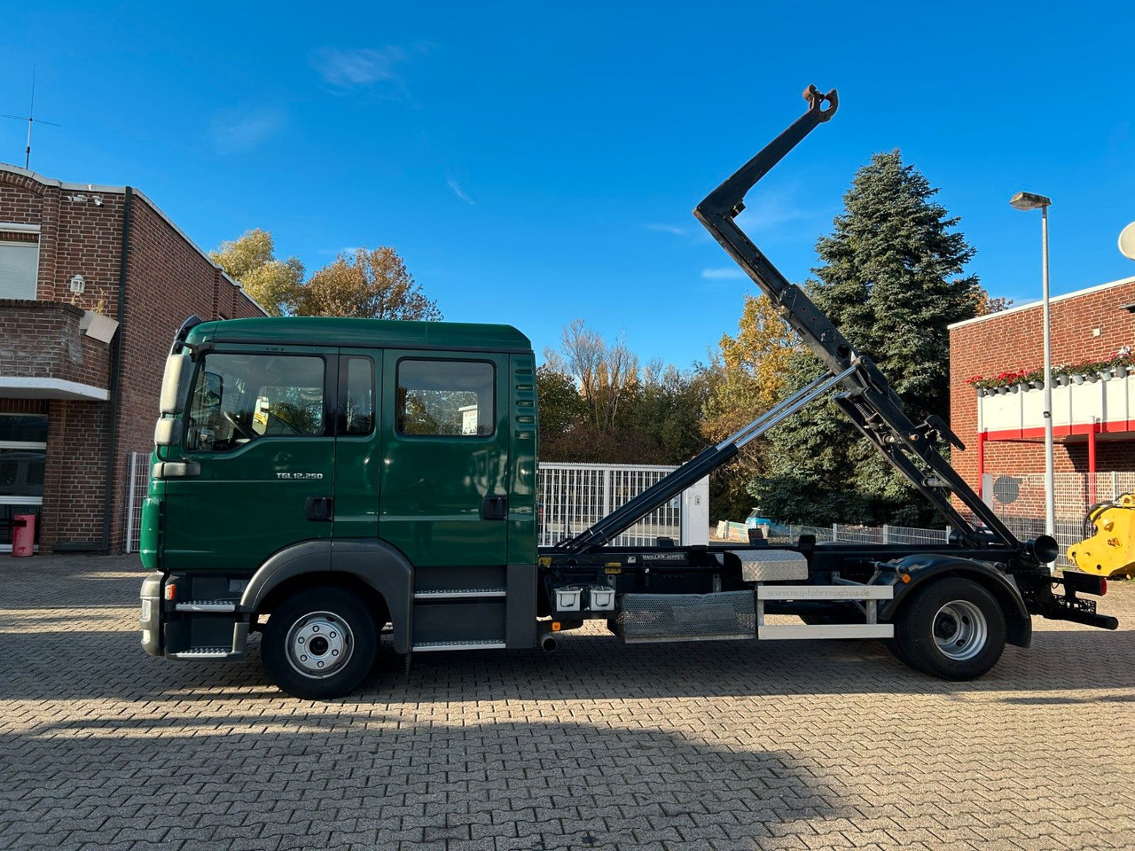 MAN 12.250 Doppelkabine Abroller - شاحنة برافعة خطافية: صورة 5 MAN 12.250 Doppelkabine Abroller - شاحنة برافعة خطافية: صورة 5