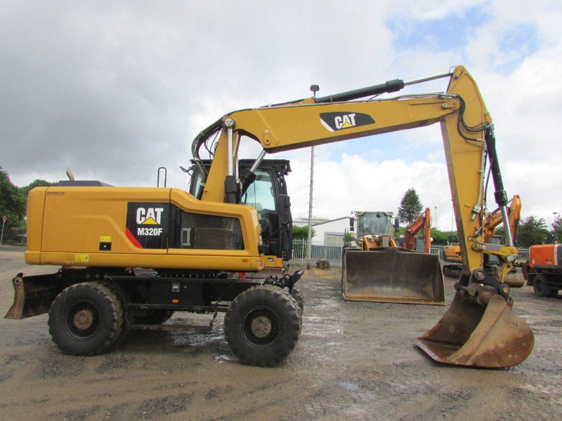Cat M 320 F Mobilbagger 69.500 EUR / AC - حفار ذو عجلات: صورة 4 Cat M 320 F Mobilbagger 69.500 EUR / AC - حفار ذو عجلات: صورة 4