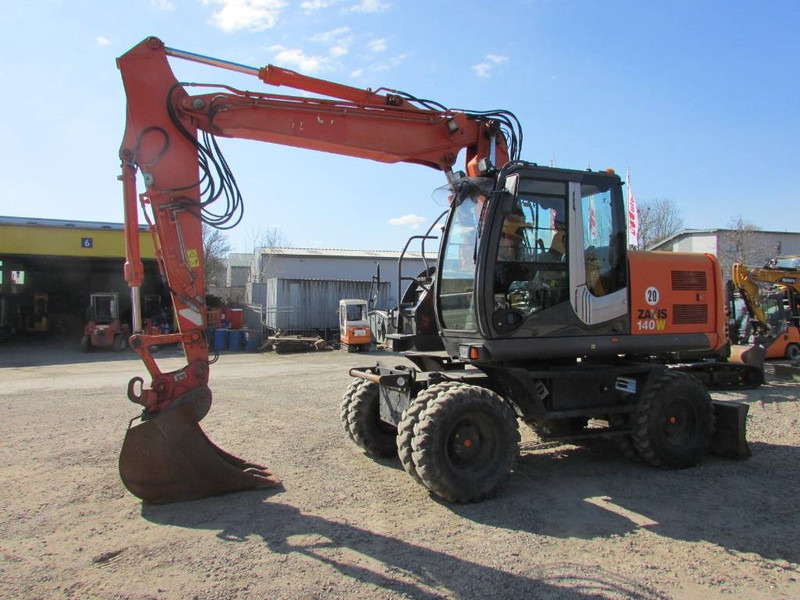 Hitachi ZX 140 W-3 Mobilbagger 43.000 EUR / Klima - حفار ذو عجلات: صورة 1 Hitachi ZX 140 W-3 Mobilbagger 43.000 EUR / Klima - حفار ذو عجلات: صورة 1