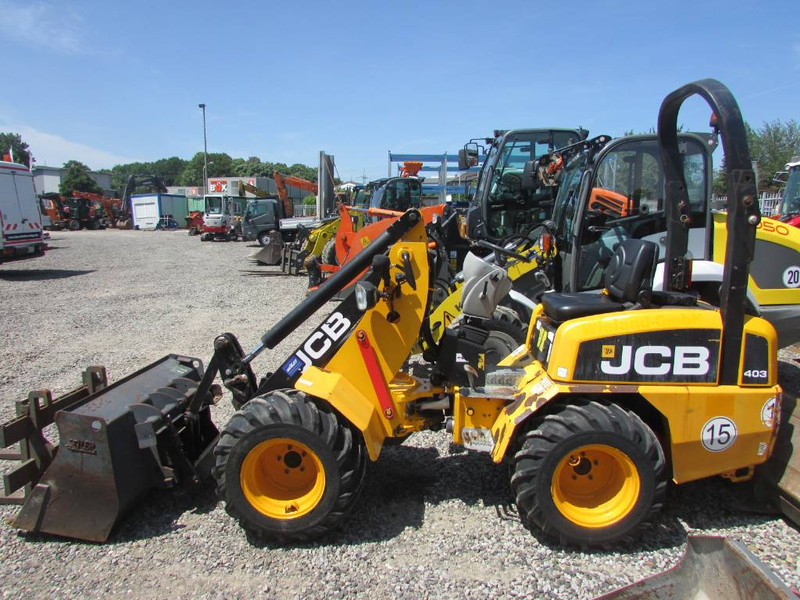JCB 403 Radlader 22.500 EUR - اللودر بعجل: صورة 1 JCB 403 Radlader 22.500 EUR - اللودر بعجل: صورة 1