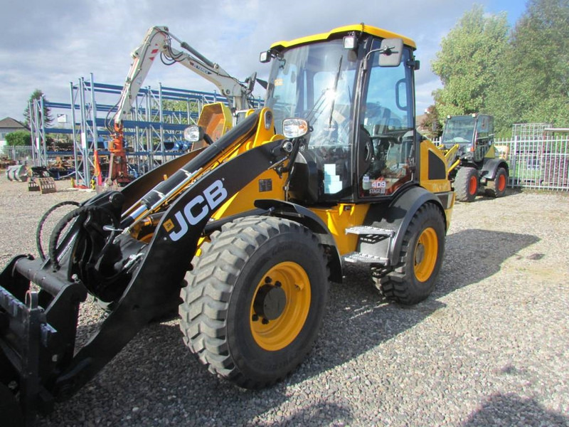 JCB 409 Radlader 46.500 EUR - اللودر بعجل: صورة 2 JCB 409 Radlader 46.500 EUR - اللودر بعجل: صورة 2