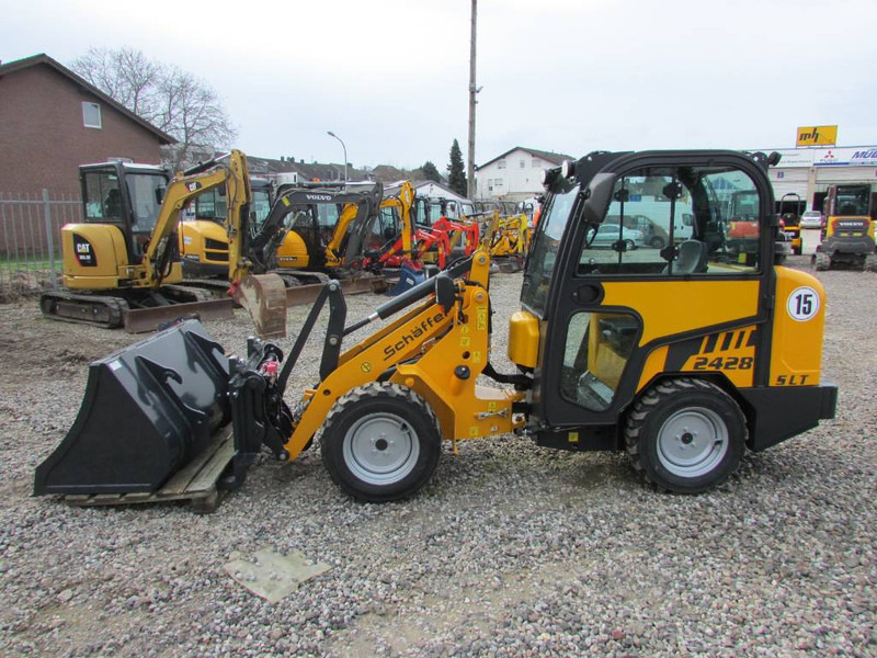 Schäffer 2428 SLT Schmalspur Radlader 32.500 - اللودر المجنزر صغير: صورة 5 Schäffer 2428 SLT Schmalspur Radlader 32.500 - اللودر المجنزر صغير: صورة 5