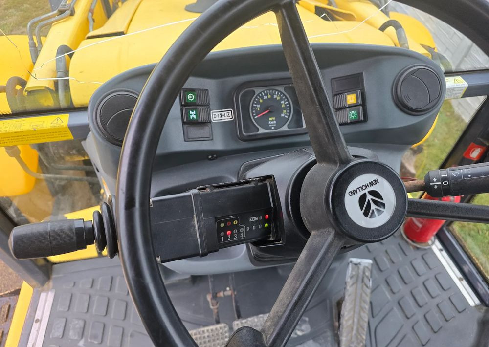 New Holland - لودر ذو محراث خلفي/ باكهو: صورة 5 New Holland - لودر ذو محراث خلفي/ باكهو: صورة 5