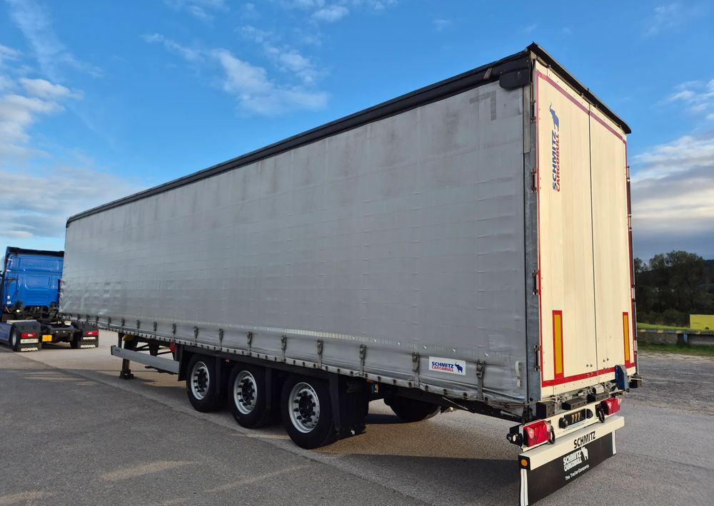 Schmitz Cargobull Varios 2021 podnoszony dach / poziomy jazdy dachu / od pierwszego właściciela / OKAZJA - نصف مقطورة بستائر جانبية: صورة 1 Schmitz Cargobull Varios 2021 podnoszony dach / poziomy jazdy dachu / od pierwszego właściciela / OKAZJA - نصف مقطورة بستائر جانبية: صورة 1