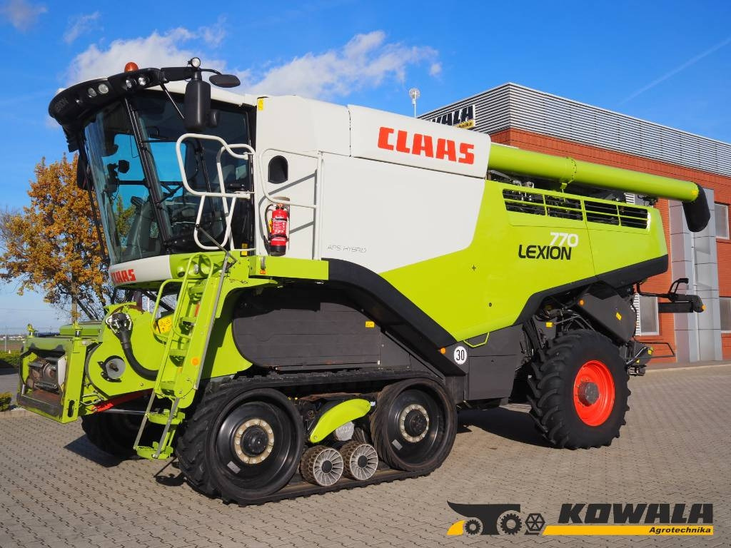 Claas Lexion 770TT 4x4 + V1200 - حصادة: صورة 1 Claas Lexion 770TT 4x4 + V1200 - حصادة: صورة 1