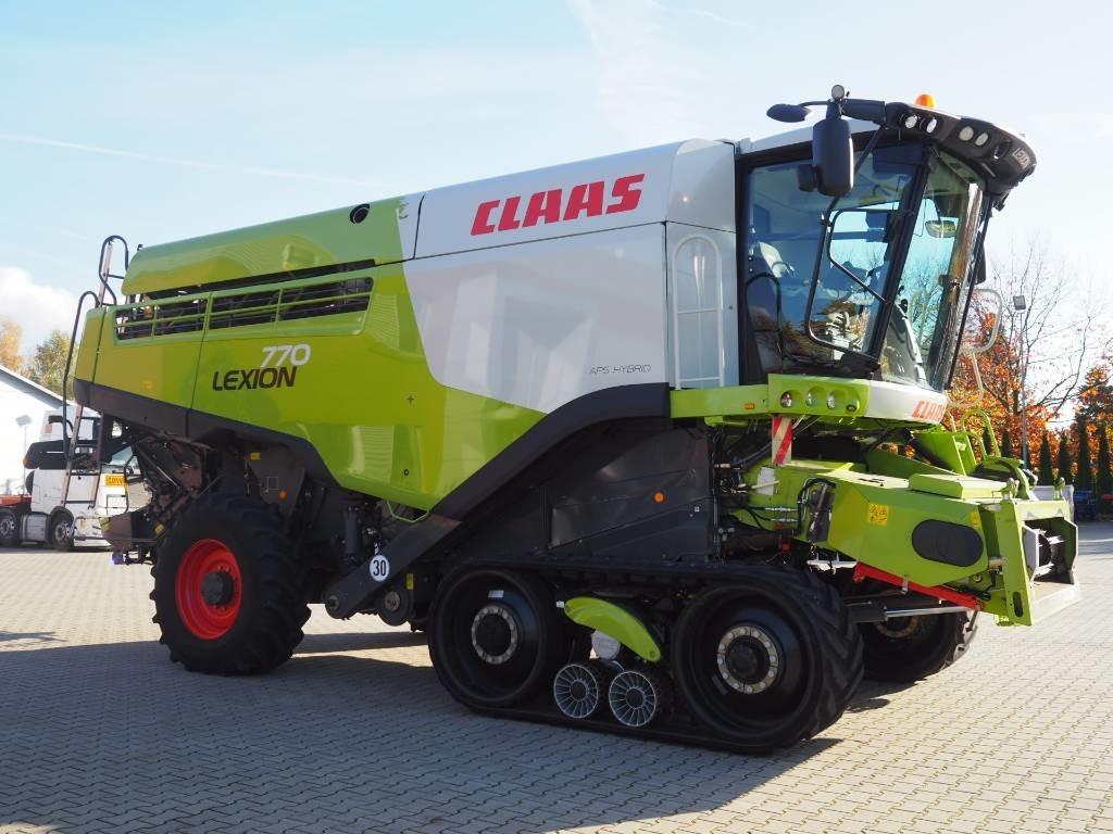 Claas Lexion 770TT 4x4 + V1200 - حصادة: صورة 4 Claas Lexion 770TT 4x4 + V1200 - حصادة: صورة 4