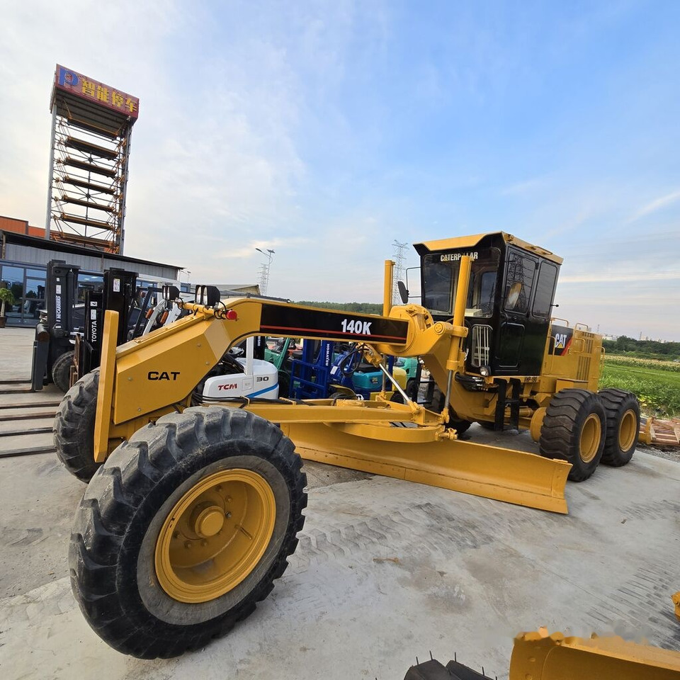 Caterpillar 140K - ماكينة تسوية: صورة 1 Caterpillar 140K - ماكينة تسوية: صورة 1