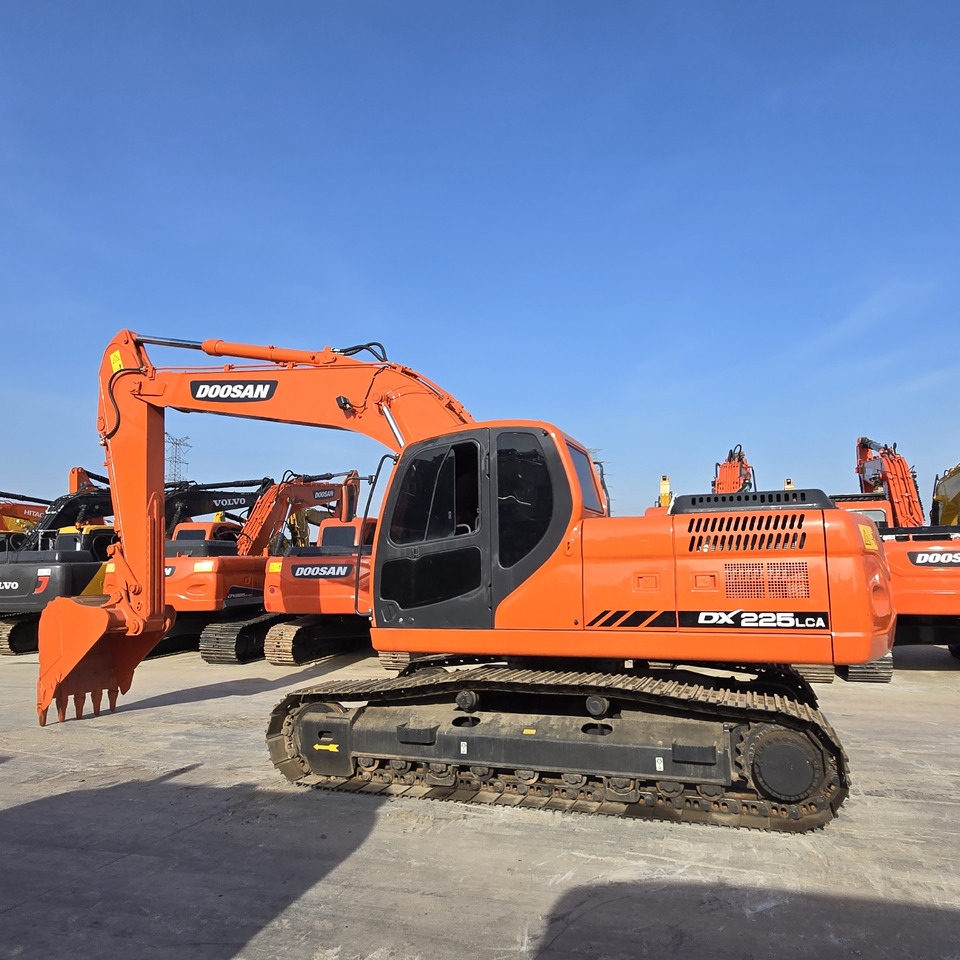 DOOSAN DX225LCA - حفار زاحف: صورة 1 DOOSAN DX225LCA - حفار زاحف: صورة 1