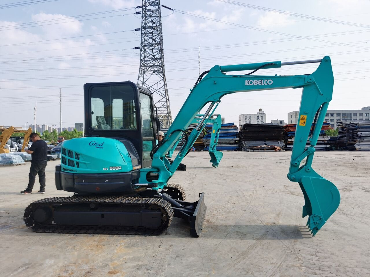 Kobelco SK55SR - حفار صغير: صورة 1 Kobelco SK55SR - حفار صغير: صورة 1