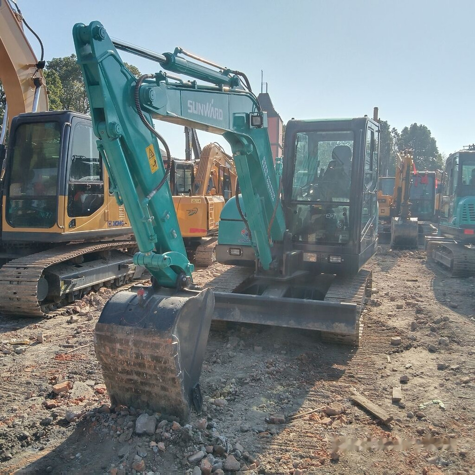 Sunward SWE60E - حفار صغير: صورة 1 Sunward SWE60E - حفار صغير: صورة 1
