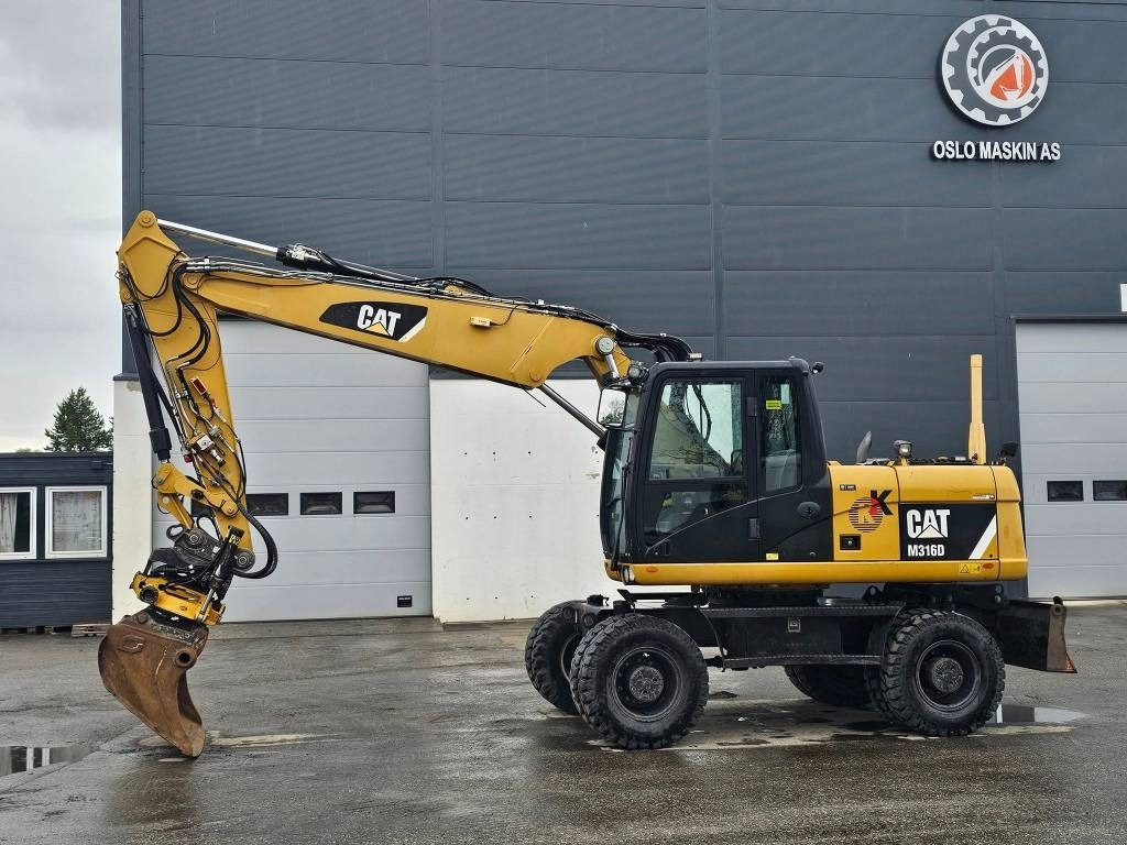 CAT M 316 D - حفار ذو عجلات: صورة 2 CAT M 316 D - حفار ذو عجلات: صورة 2