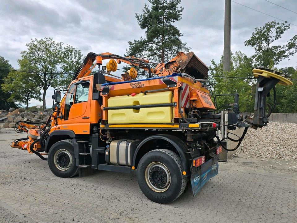 Unimog U400 2013 405/10 405/12 NKS-Z-UGN-43K Bluetec 5 Mercedes-Benz UGE UGN Mulag MKM700 Mähausleger Böschungsmäher Böschungsmulcher Küpper-Weisser IMS Salzstreuer - جرافة ثلج: صورة 3 Unimog U400 2013 405/10 405/12 NKS-Z-UGN-43K Bluetec 5 Mercedes-Benz UGE UGN Mulag MKM700 Mähausleger Böschungsmäher Böschungsmulcher Küpper-Weisser IMS Salzstreuer - جرافة ثلج: صورة 3