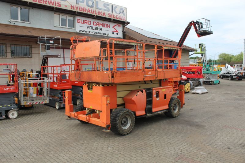 Podnośnik nożycowy 4x4 terenowy 15 m JLG 4394 RT - مرفاع مقصي: صورة 1 Podnośnik nożycowy 4x4 terenowy 15 m JLG 4394 RT - مرفاع مقصي: صورة 1