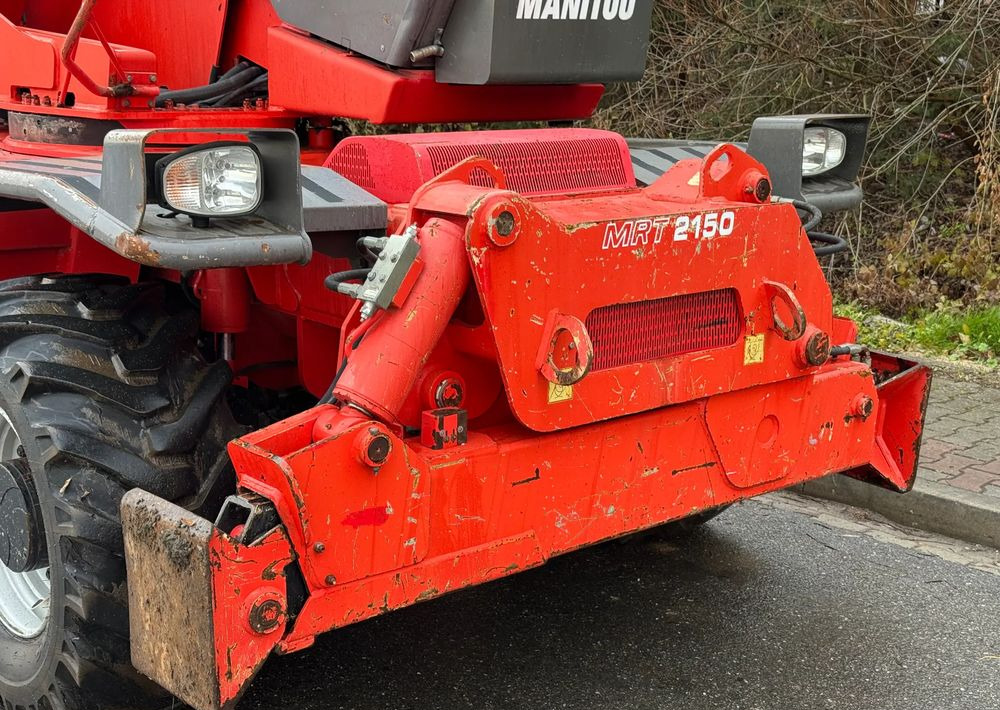 Manitou ŁADOWARKA TELESKOPOWA MANITOU MRT 2150 STAN IDEALNY - آلة رفع ونقل تلسكوبية: صورة 4 Manitou ŁADOWARKA TELESKOPOWA MANITOU MRT 2150 STAN IDEALNY - آلة رفع ونقل تلسكوبية: صورة 4
