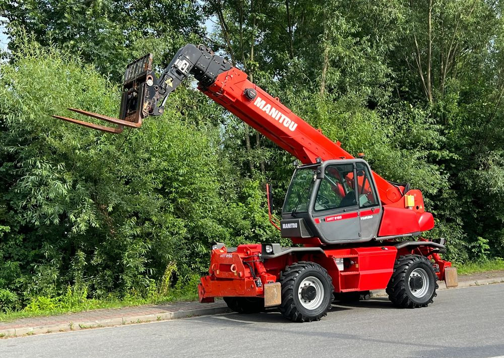 Manitou ŁADOWARKA TELESKOPOWA MANITOU MRT 2150 STAN IDEALNY - آلة رفع ونقل تلسكوبية: صورة 1 Manitou ŁADOWARKA TELESKOPOWA MANITOU MRT 2150 STAN IDEALNY - آلة رفع ونقل تلسكوبية: صورة 1