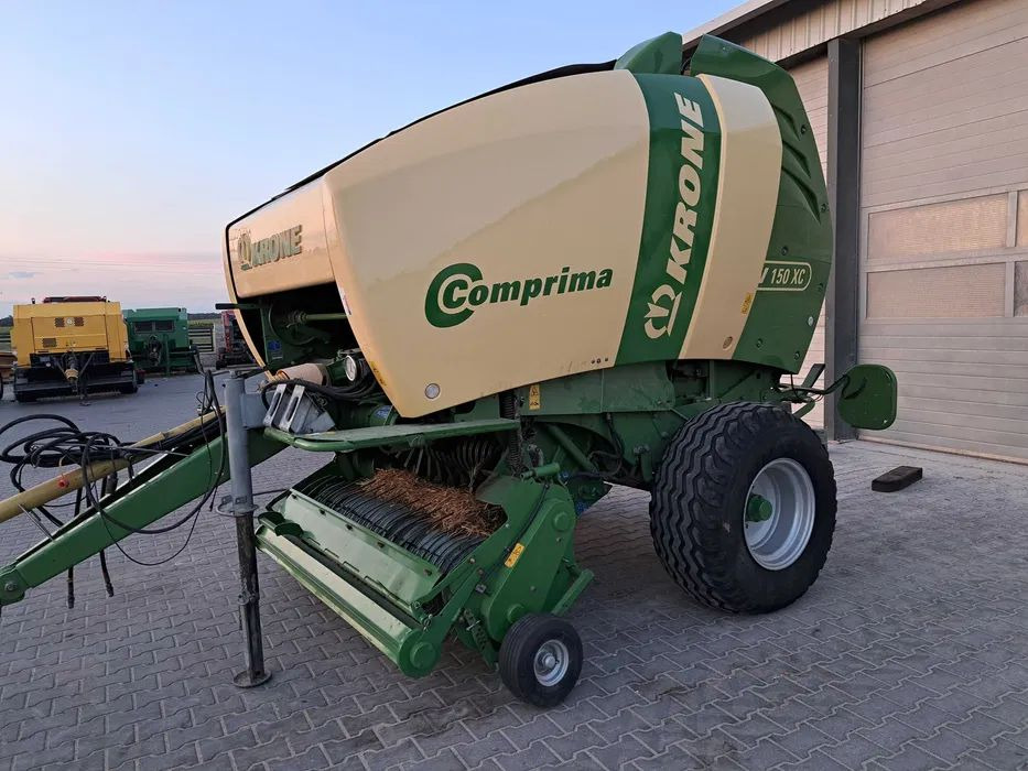 Prasa rolująca Krone Comprima 150XC - آلة بالات دائرية: صورة 1 Prasa rolująca Krone Comprima 150XC - آلة بالات دائرية: صورة 1