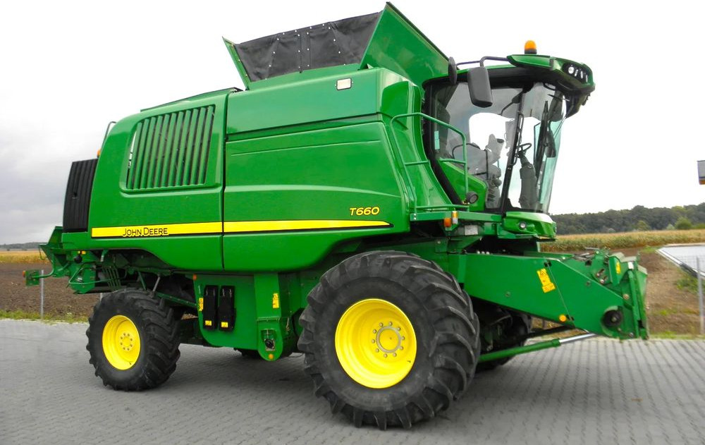 John Deere T660 2014 Rok, heder 7,6m, 2700 mtg na silniku, Najbogatsza Wersja, Nie Malowany, Stan Idealny - حصادة: صورة 2 John Deere T660 2014 Rok, heder 7,6m, 2700 mtg na silniku, Najbogatsza Wersja, Nie Malowany, Stan Idealny - حصادة: صورة 2
