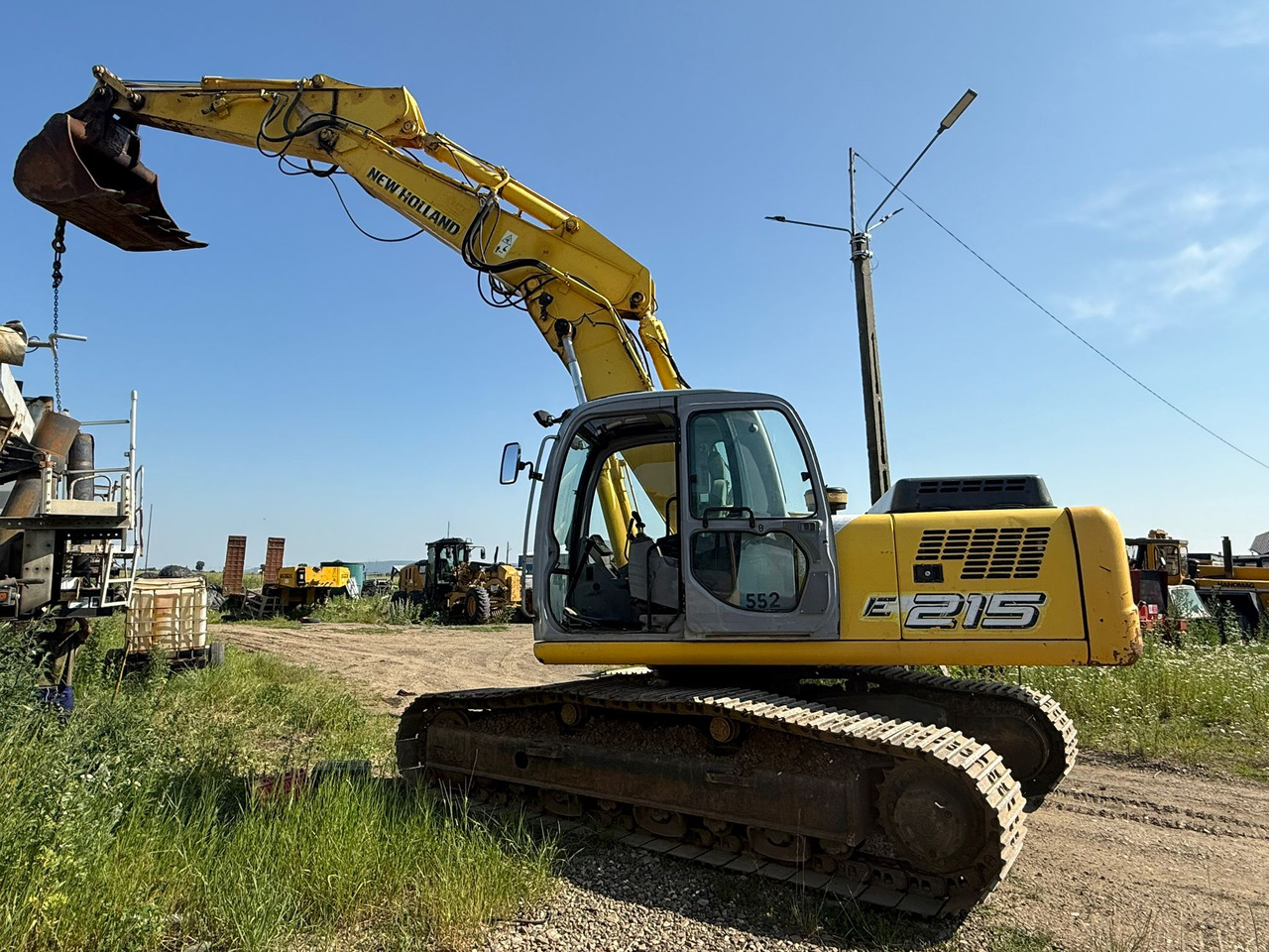 NEW HOLLAND E 215 EXCAVATOR - حفار زاحف: صورة 2 NEW HOLLAND E 215 EXCAVATOR - حفار زاحف: صورة 2