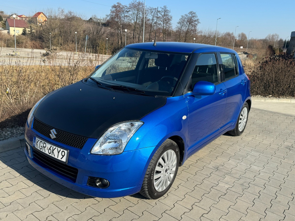 Suzuki Swift 1.3 benzyna 90km Klimatyzacja 136tys przebieg Auto prywatne zadbane - سيارة: صورة 3 Suzuki Swift 1.3 benzyna 90km Klimatyzacja 136tys przebieg Auto prywatne zadbane - سيارة: صورة 3