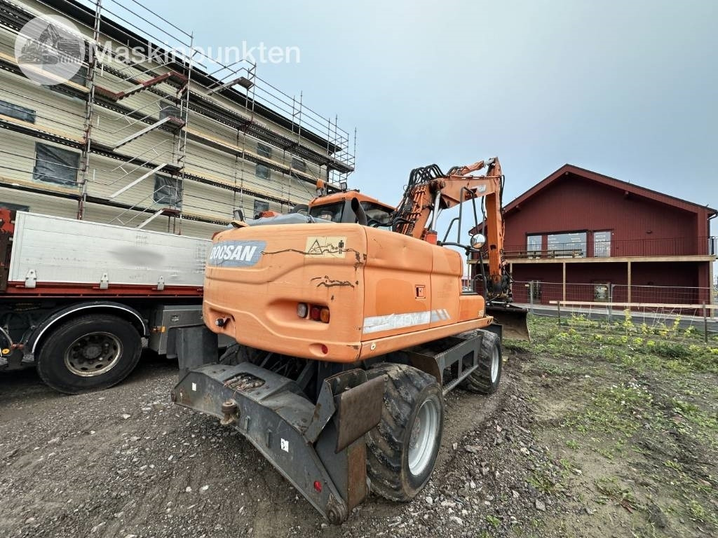 Doosan DX 140 W med vagn och redskap - حفار ذو عجلات: صورة 4 Doosan DX 140 W med vagn och redskap - حفار ذو عجلات: صورة 4