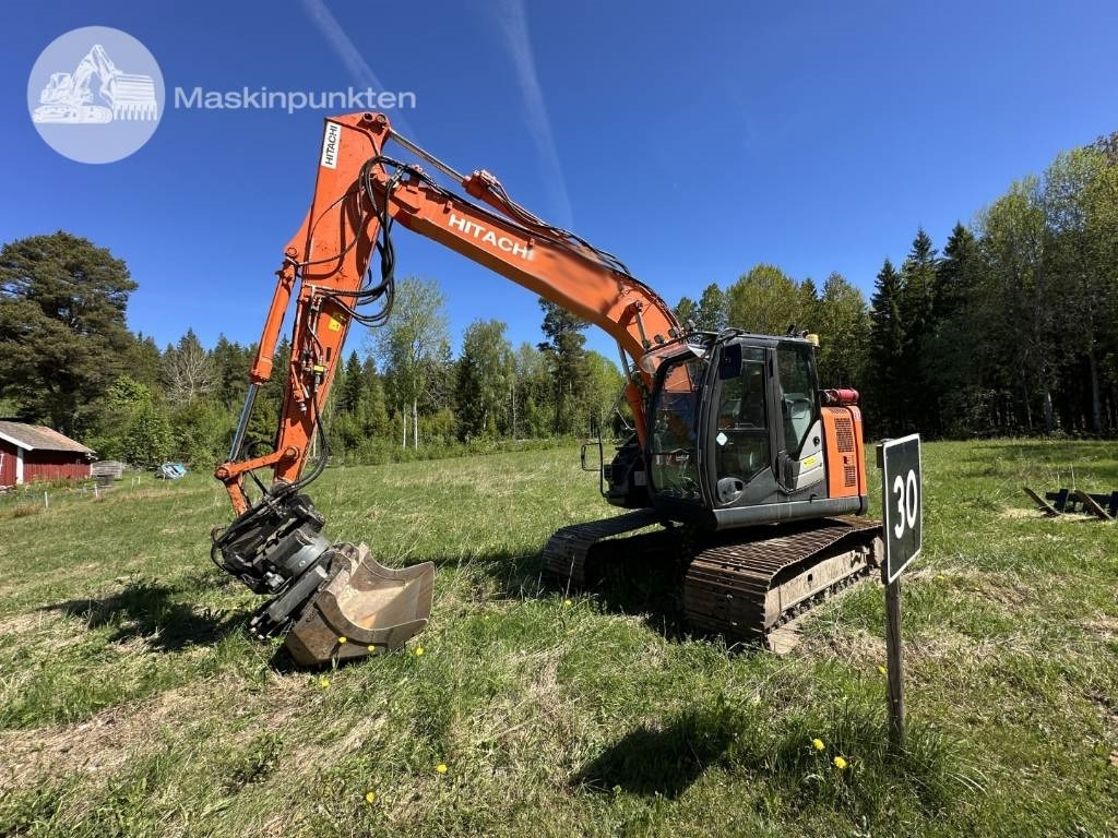 Hitachi ZX 135 US-6 - حفار زاحف: صورة 1 Hitachi ZX 135 US-6 - حفار زاحف: صورة 1