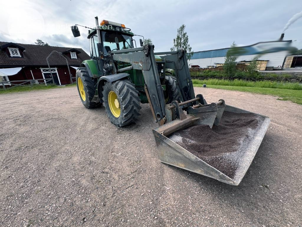 John Deere 7600 - جرار: صورة 1 John Deere 7600 - جرار: صورة 1