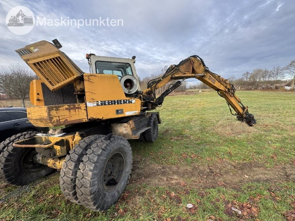 Liebherr A 310 B - حفار ذو عجلات: صورة 3 Liebherr A 310 B - حفار ذو عجلات: صورة 3