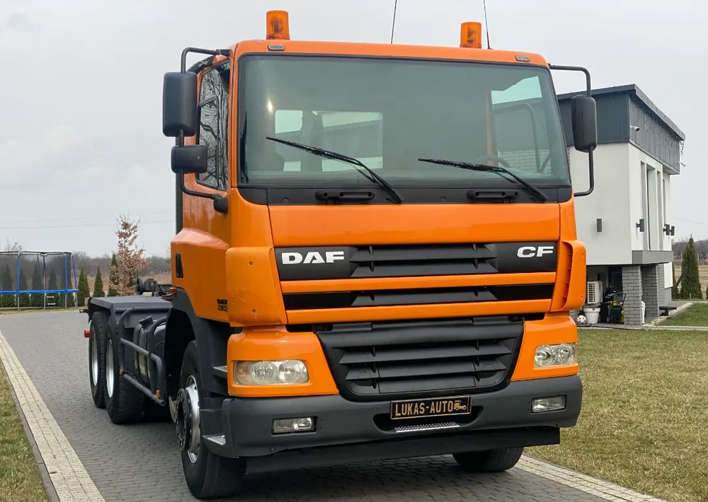 DAF CF 85.340 6X4 MANUAL - شاحنة برافعة خطافية: صورة 1 DAF CF 85.340 6X4 MANUAL - شاحنة برافعة خطافية: صورة 1