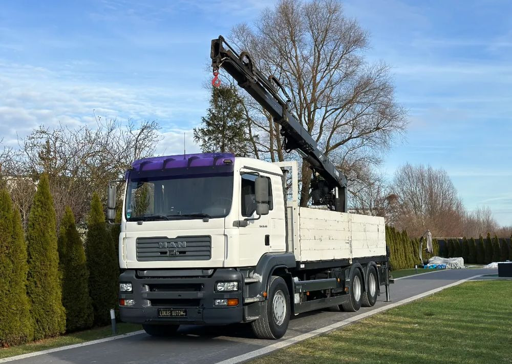 MAN TGA 24.410 6x4 HIAB MANUAL - شاحنات مسطحة, شاحنة كرين: صورة 1 MAN TGA 24.410 6x4 HIAB MANUAL - شاحنات مسطحة, شاحنة كرين: صورة 1
