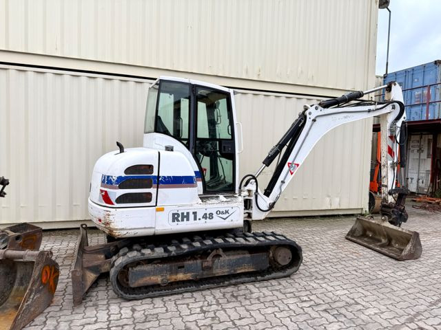 O & K RH1.48 / 4.680 KG / Greifer + 3 x Löffel - حفار صغير: صورة 4 O & K RH1.48 / 4.680 KG / Greifer + 3 x Löffel - حفار صغير: صورة 4