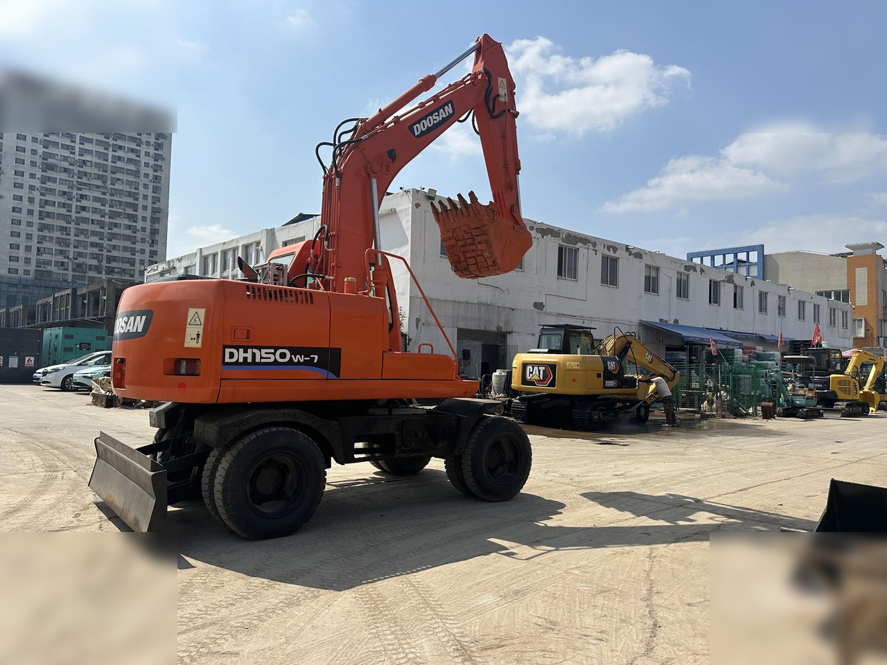 DOOSAN DH150W-7 - حفار ذو عجلات: صورة 1 DOOSAN DH150W-7 - حفار ذو عجلات: صورة 1