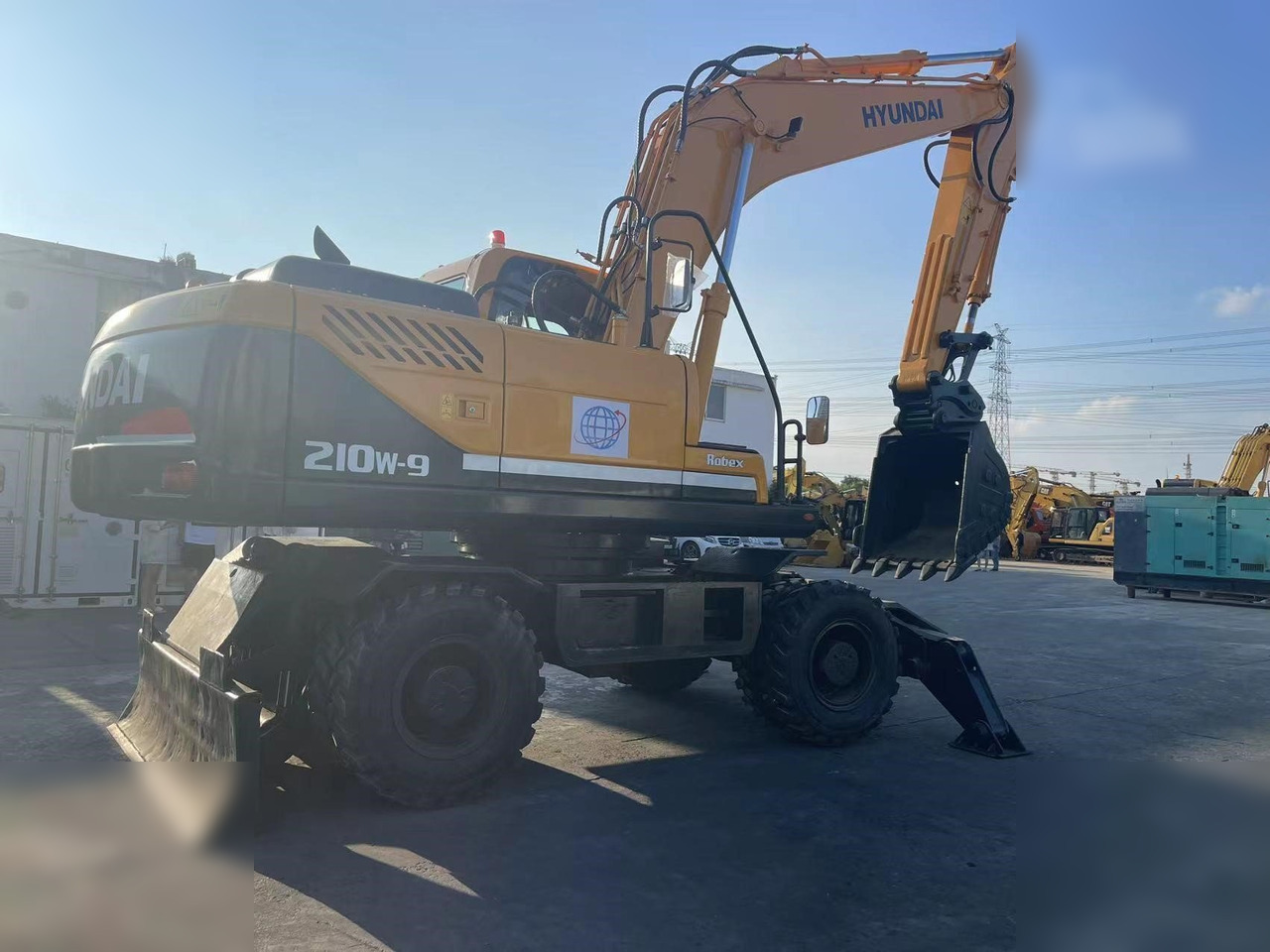 HYUNDAI ROBEX 210W-9 - حفار ذو عجلات: صورة 2 HYUNDAI ROBEX 210W-9 - حفار ذو عجلات: صورة 2