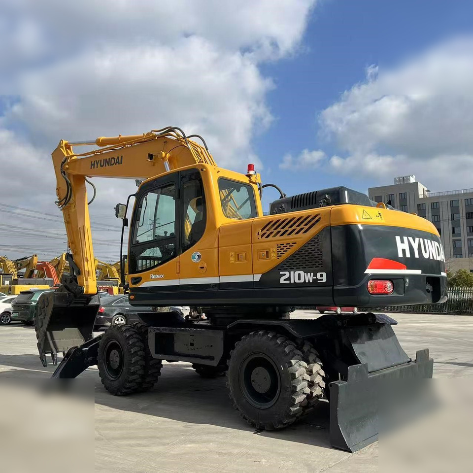 HYUNDAI ROBEX 210W-9 - حفار ذو عجلات: صورة 1 HYUNDAI ROBEX 210W-9 - حفار ذو عجلات: صورة 1
