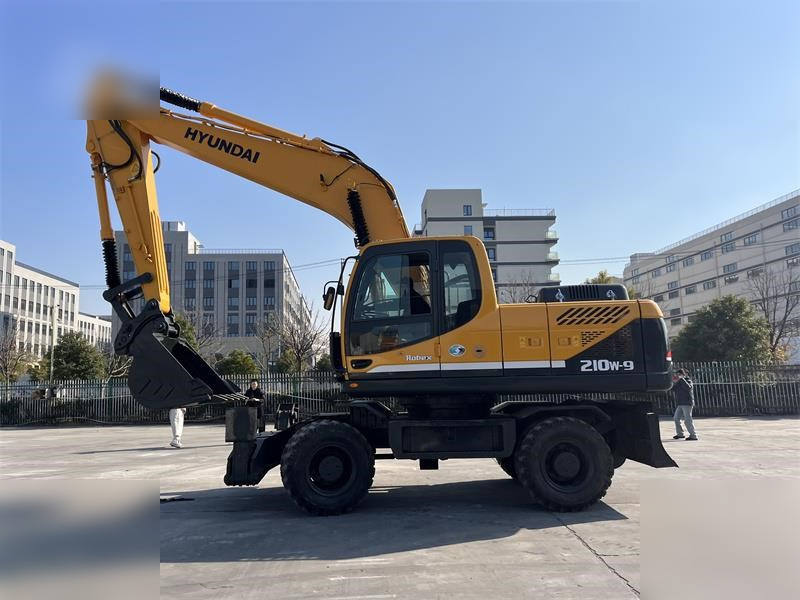 HYUNDAI ROBEX 210W-9 - حفار ذو عجلات: صورة 1 HYUNDAI ROBEX 210W-9 - حفار ذو عجلات: صورة 1