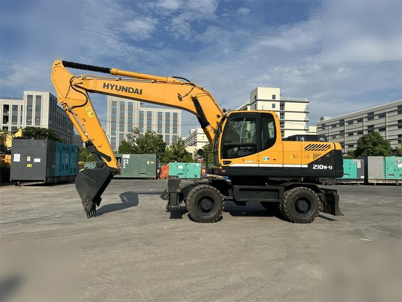 HYUNDAI ROBEX 210W-9 - حفار ذو عجلات: صورة 1 HYUNDAI ROBEX 210W-9 - حفار ذو عجلات: صورة 1