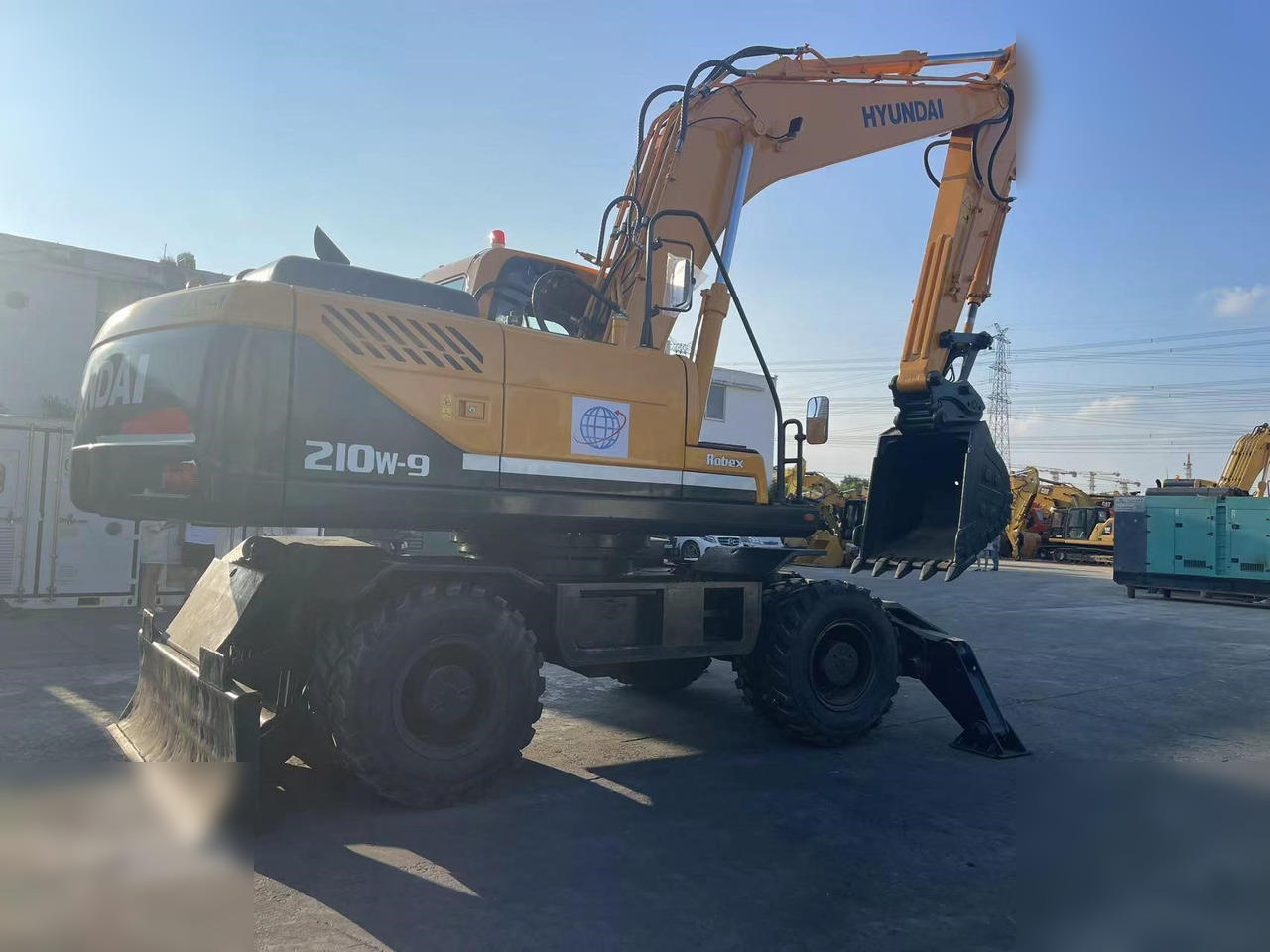 HYUNDAI ROBEX 210W-9 - حفار ذو عجلات: صورة 2 HYUNDAI ROBEX 210W-9 - حفار ذو عجلات: صورة 2